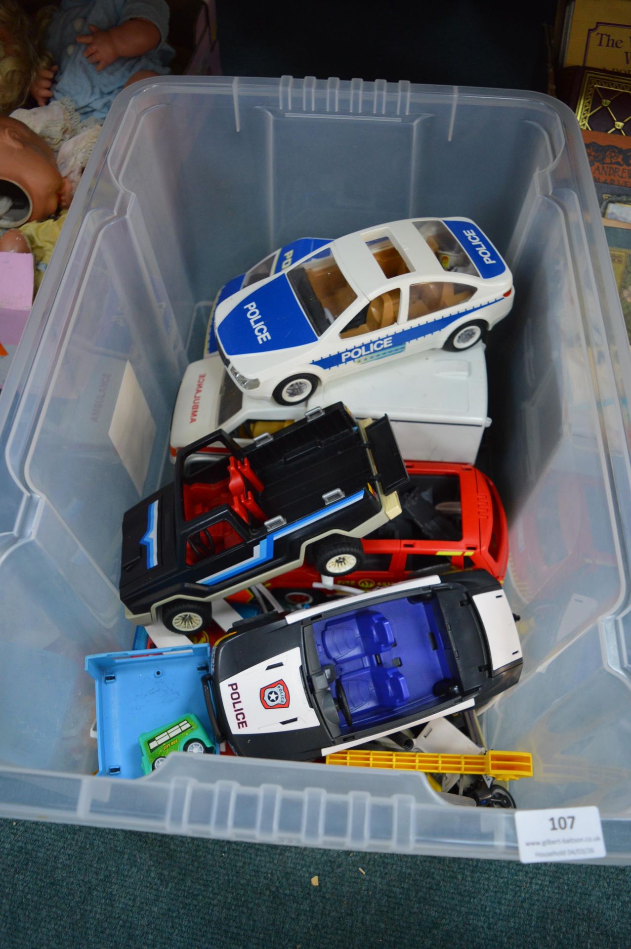 Toy Vehicles Including Police, Ambulance, and Fire Engines