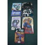 4x DC Graphic Novels, and a 1x Stitch Colouring Book