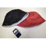 2x Puffa Reversible Hats (1x black, 1x red)