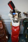 Golf Bag and Assorted Vintage Golf Clubs