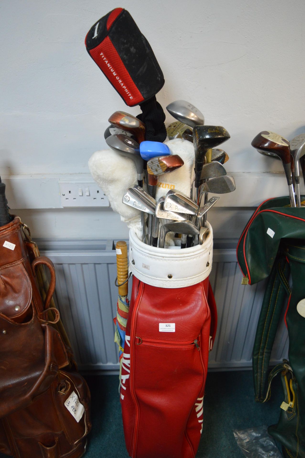 Golf Bag and Assorted Vintage Golf Clubs