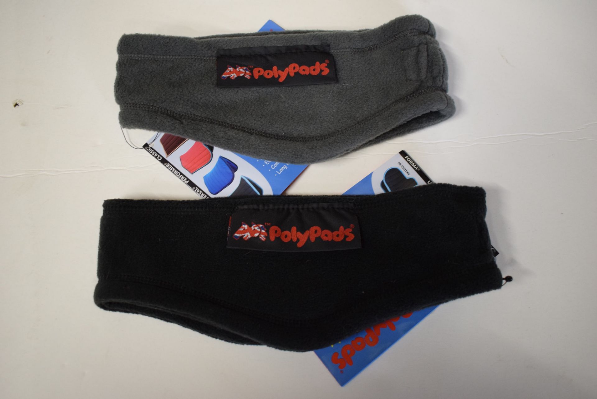 2x Poly Pads Warm Riders Size: 2 (1x black, 1x grey)