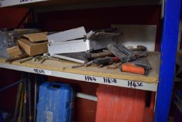 *Contents of Shelf to Include Hand Saws, Hole Cutters, and a Metal Tool Tin
