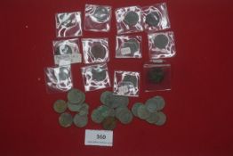 Collection of coins including cartwheel pennies and smaller denominations, some in holders, includes