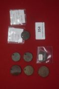 Group of altered coins and medallions including holed pieces, cut coin (George V farthing noted) and