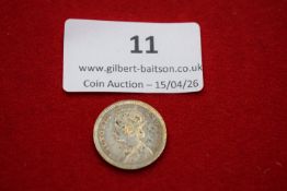 India – Victoria silver quarter rupee, 1883. Crowned bust left with imperial titles; rev. ornate