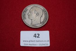 Venezuela silver 5 bolivares, 1926. Bust left; rev. national arms with legend ‘Estados Unidos de