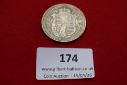 George V silver half crown, 1913. Circulated.