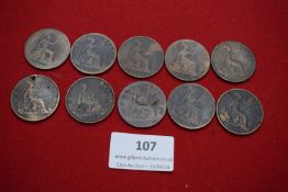 Ten Victorian bronze pennies dated between 1881 and 1890 (various), mostly well worn, one holed.