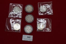 Small group of commemorative 50p coins including Beatrix Potter types and others, mixed condition,