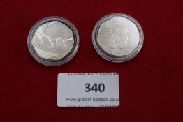 Two Olympic 50p coins, swimming and boxing types, in capsules.