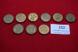 Group of brass threepences including George VI and Elizabeth II issues dated 1937–1953 (various).