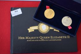 Pair of commemorative medals: 2002 Golden Jubilee medal and 1977 Silver Jubilee medal, in fitted