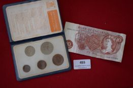 Britain’s first decimal coin set in wallet, together with a Bank of England ten shillings note.