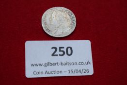 Great Britain shilling, 1746. George II laureate bust left; crowned cruciform shields reverse.