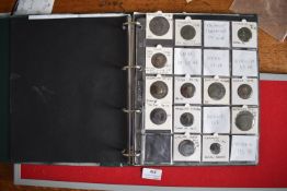 Large collection of Roman and Byzantine bronze coins, housed in an album, spanning Augustus