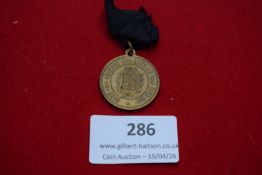 Queen Victoria Diamond Jubilee medal, 1897, with original black mourning ribbon. Bronze. Very fine.