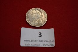 George II silver shilling, 1745. Laureate bust left; rev. crowned cruciform shields with central