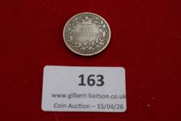 Victorian silver shilling, 1873, young head, crowned wreath reverse. Circulated.