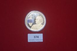 Two modern commemorative medallions, including a “British Banknotes” themed gilt-type medallion