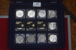 Collection of modern crowns and commemorative medallions, including various Elizabeth II issues,