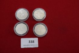 Group of commemorative 50p coins including “Diversity Built Britain” and other types, in capsules.