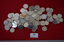 Large quantity of transport tokens and similar pieces.