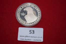 United States silver dollar, 1983 Los Angeles Olympic commemorative, in capsule. Olympic discus