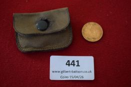 Victoria young head gold sovereign, 1854, with small leather pouch