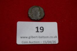 Ancient bronze coin, Roman Imperial period. Radiate bust right; rev. indistinct figure type.