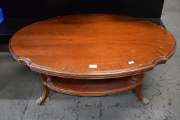 Oval Mahogany Table on Metal Claw Feet