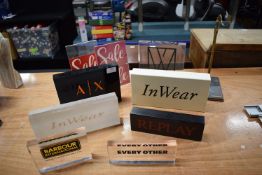 *Quantity of Branded Advertising Blocks, Paul Smith Handbag Display Hook, etc.