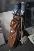 Golf Bag, Caddy, and Set of Golf Clubs