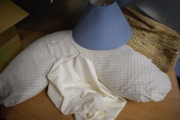 U-Shaped Support Pillow with Cover, Lampshade, and a Rug