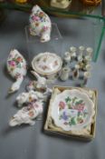 Floral Pottery Ornaments Including Animals and Miniature Vases