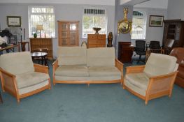 Ercol Large 3pc Suite with Rattan Panelling Comprising Two Seat Sofa, and 2x Armchairs