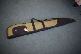 Wildhunter green and black padded rifle slip with carry handles, shoulder strap and external zip
