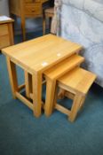 Nest of Three Light Oak Tables