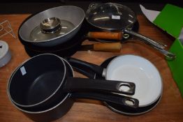 Assorted Cookware Including Frying Pans, Woks, Saucepans, etc.