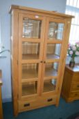 Ercol Glazed Cabinet with Bevelled Glass and Drawer