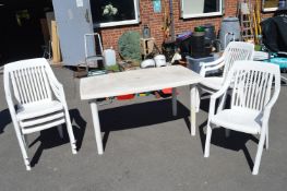 White Plastic Patio Table and 6x Stacking Chairs