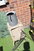Metal Cabinet, Galvanised Watering Can, and a Hilltop Farm Sign