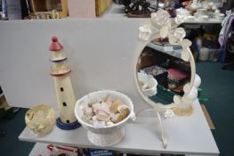 Shelves, Lighthouse, and a Metal Framed Mirror