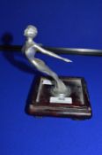 White Metal Art Deco Car Mascot on Wooden Stand