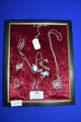 Display Frame Containing Silver Pendants and Earring ~26g total