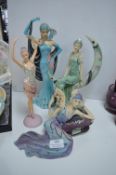 Four Lady Figures