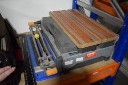 Tabletop Workmate, Tile Cutter, and a Plastic Square