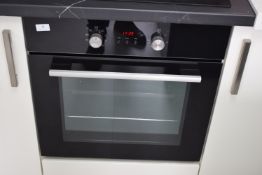 * Built-In Electric Oven Model: UBO653BK