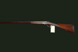 Hammer Action 12 Bore Shotgun, serial number not visible, fitted with 30-inch barrels. Traditional