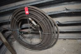 Fuel Delivery Hose and Nozzle on Reel